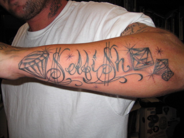 ryan sheckler chest tattoo font